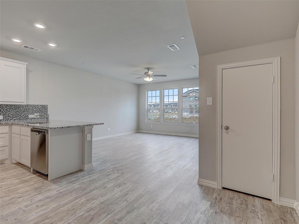 3337 Solana Circle Denton, TX 76207 - Photo 7 of 22 Kitchen featuring dishwasher, ceiling fan, light wood finished floors, white cabinetry, and recessed lighting