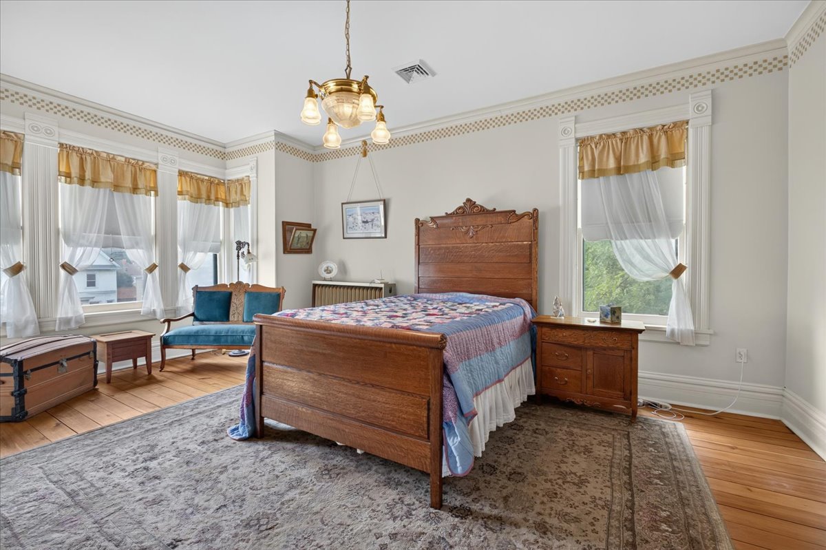 622 North 7th Street Rochelle, IL 61068 - Photo 34 of 52 a spacious bedroom with a bed and a window