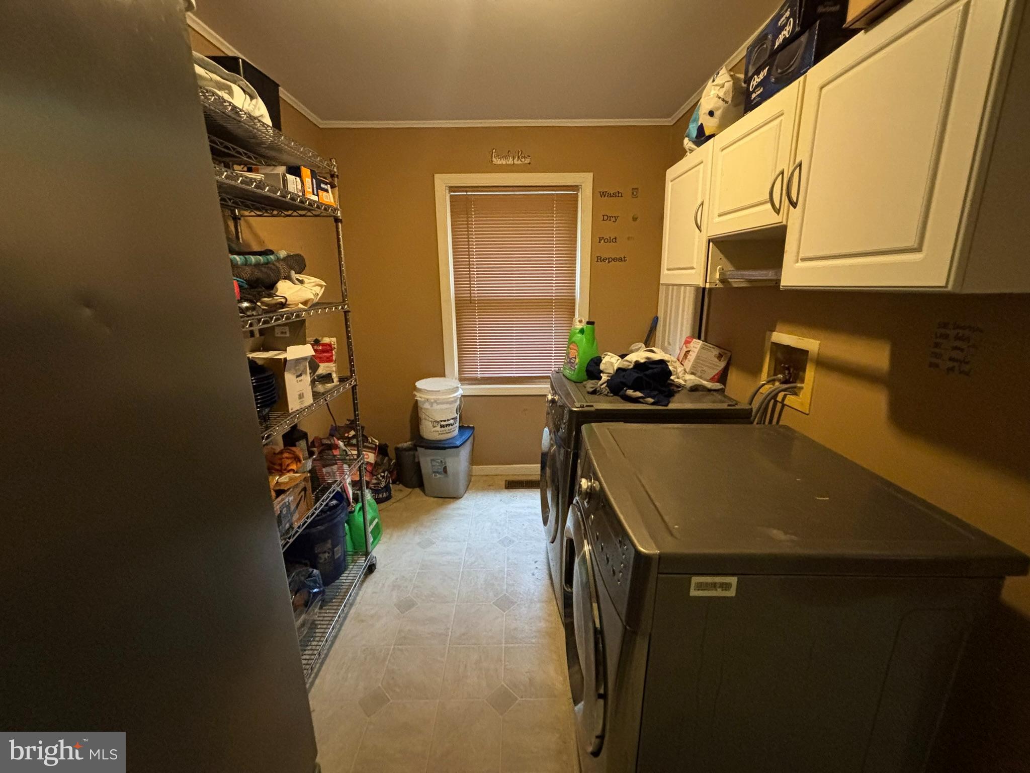 6615 Stanley Road King George, VA 22485 - Photo 14 of 30 a room with furniture a window and potted plants