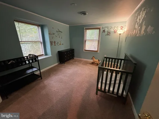 a view of livingroom with furniture and windows