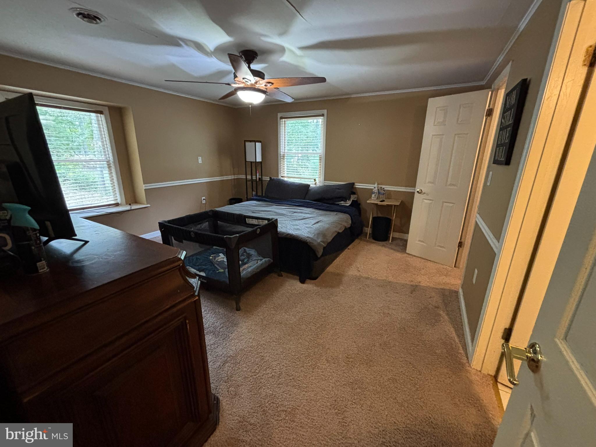 6615 Stanley Road King George, VA 22485 - Photo 8 of 30 a bedroom with furniture and a window