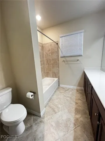 a bathroom with a sink and a vanity