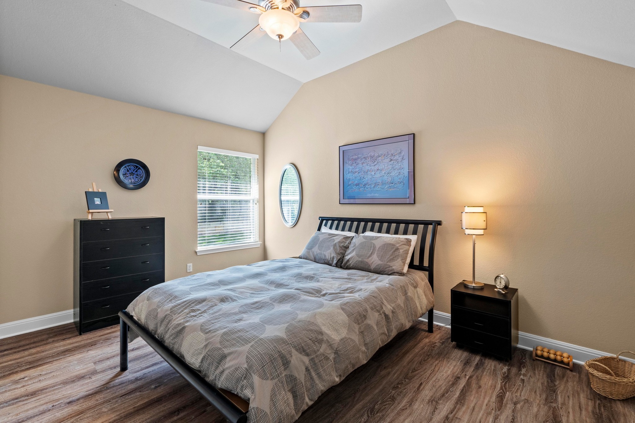 135 Tumbleweed Trail North Austin, TX 78733 - Photo 16 of 39 Bedroom #3 has a peaceful view and comes with a cathedral-style ceiling.
