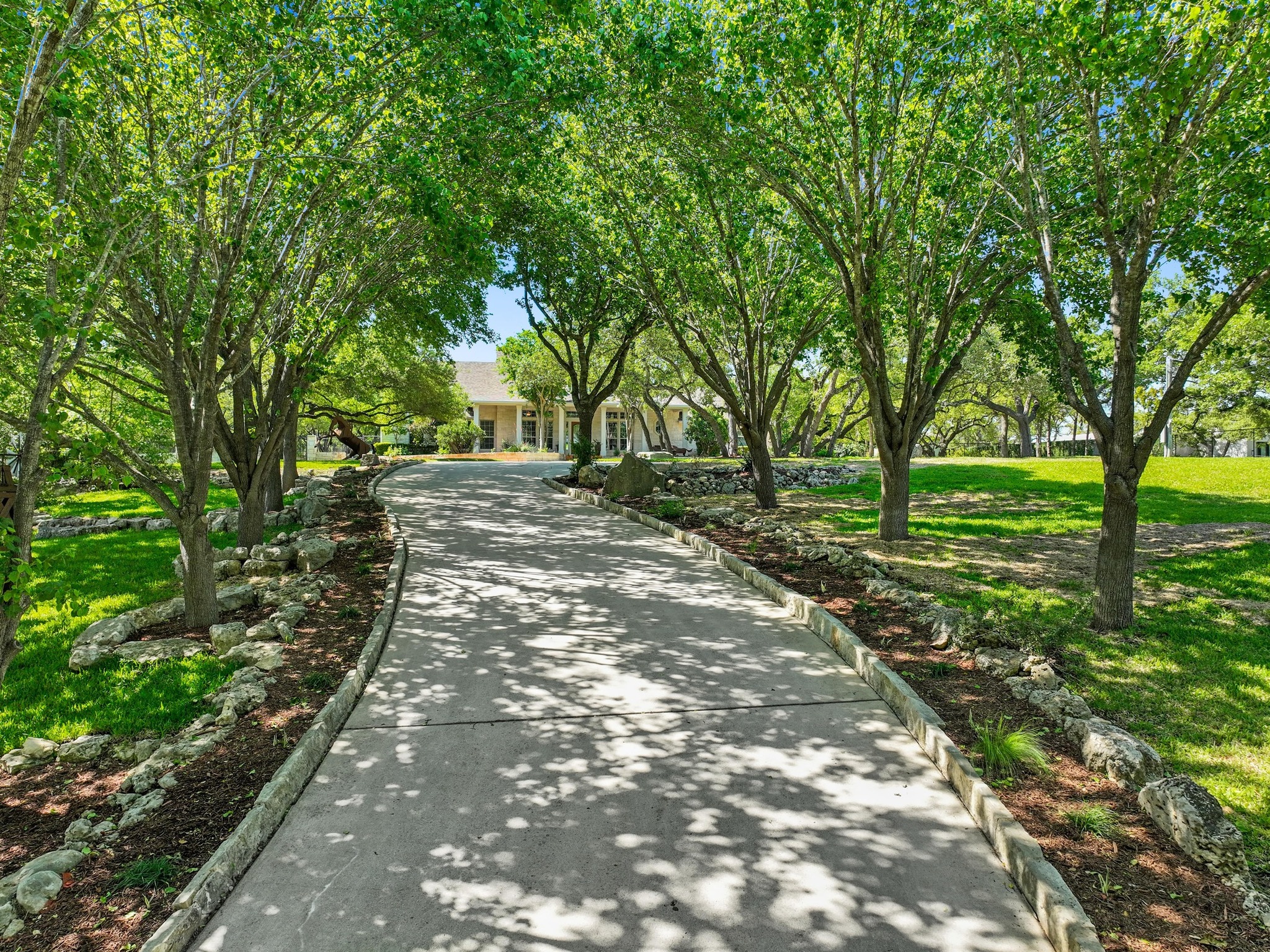 135 Tumbleweed Trail North Austin, TX 78733 - Photo 2 of 39 Up this driveway are new beginnings!
