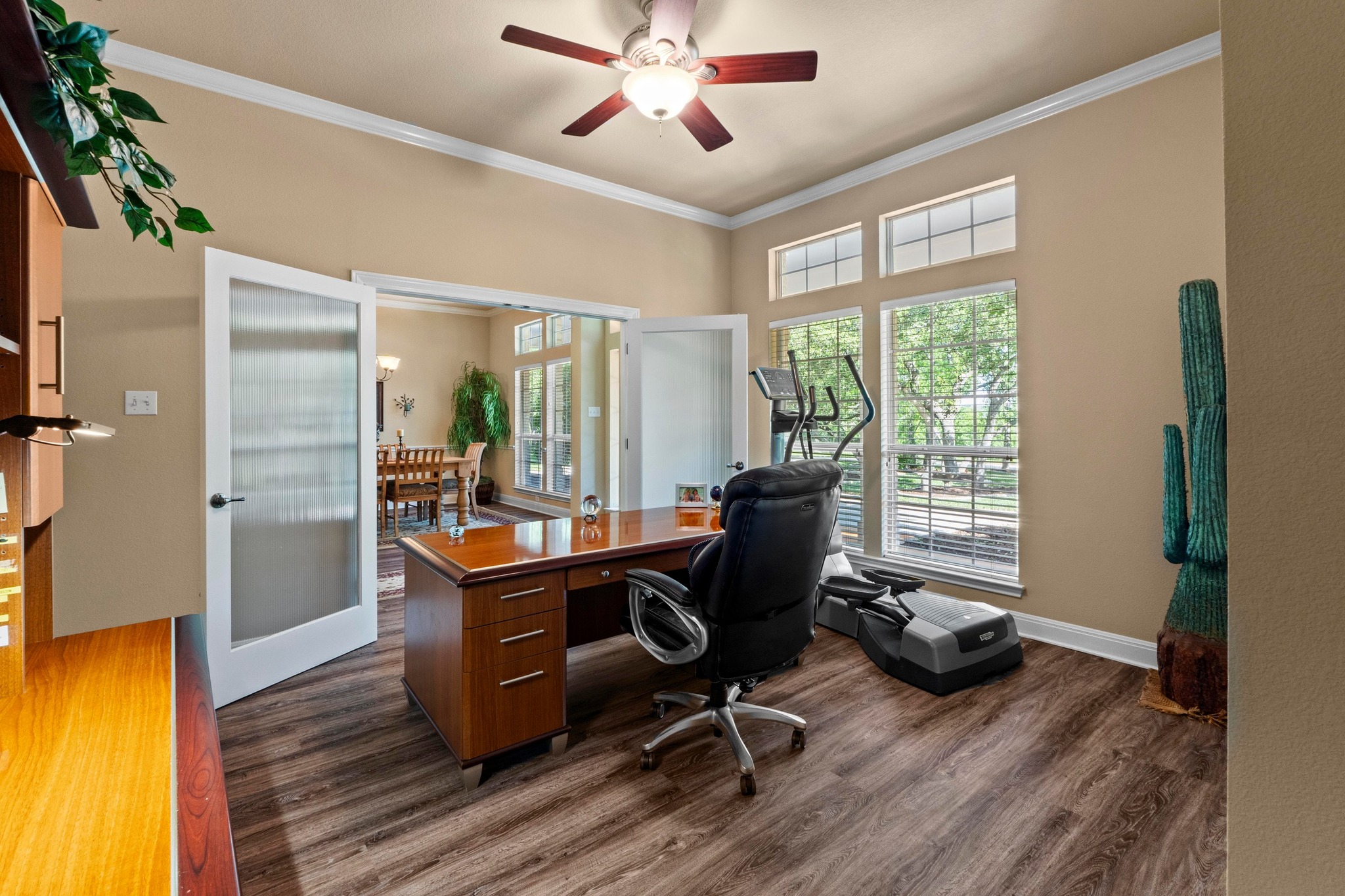 135 Tumbleweed Trail North Austin, TX 78733 - Photo 10 of 39 The office has French doors with reeded glass and a large walk-in closet with shelving, which is a dream when you work out of your home.