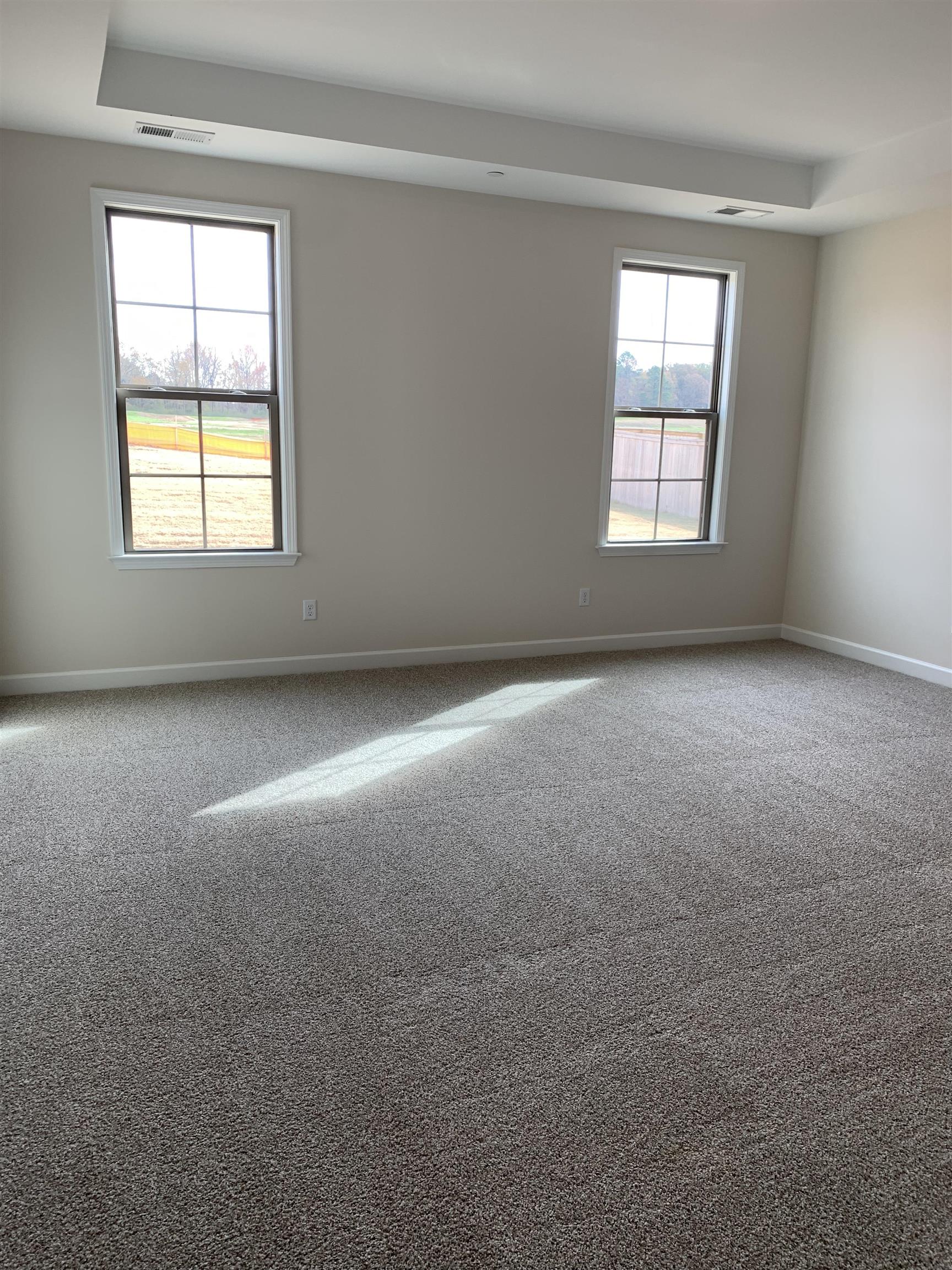 35 Grassy Hill Road Collierville, TN 38017 - Photo 14 of 33 an empty room with a window