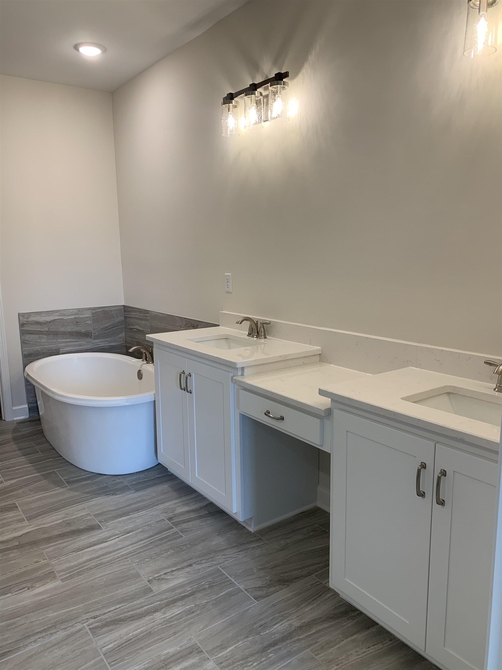 35 Grassy Hill Road Collierville, TN 38017 - Photo 16 of 33 a bathroom with a sink and a mirror