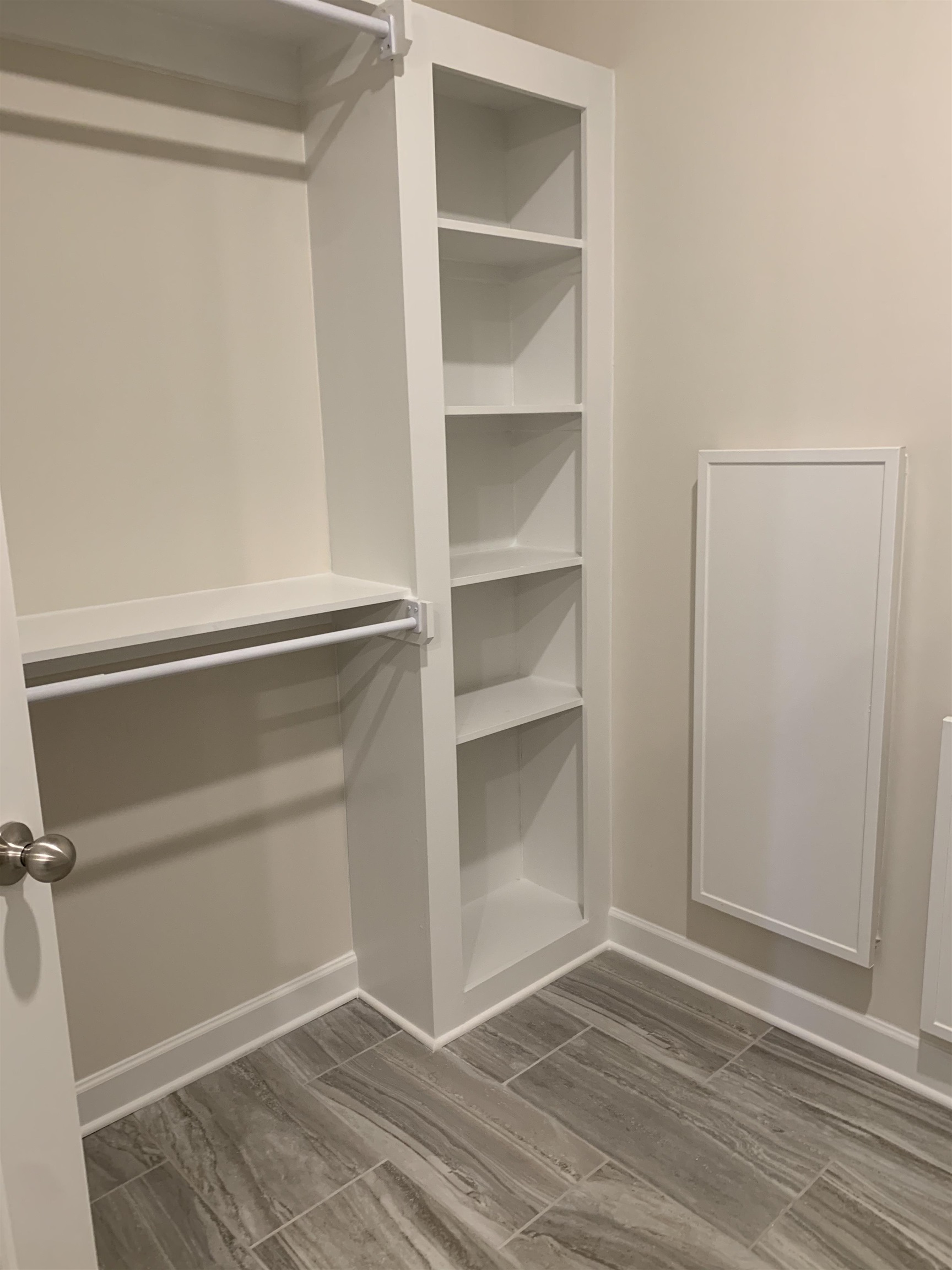 35 Grassy Hill Road Collierville, TN 38017 - Photo 20 of 33 a view of an empty walk in closet