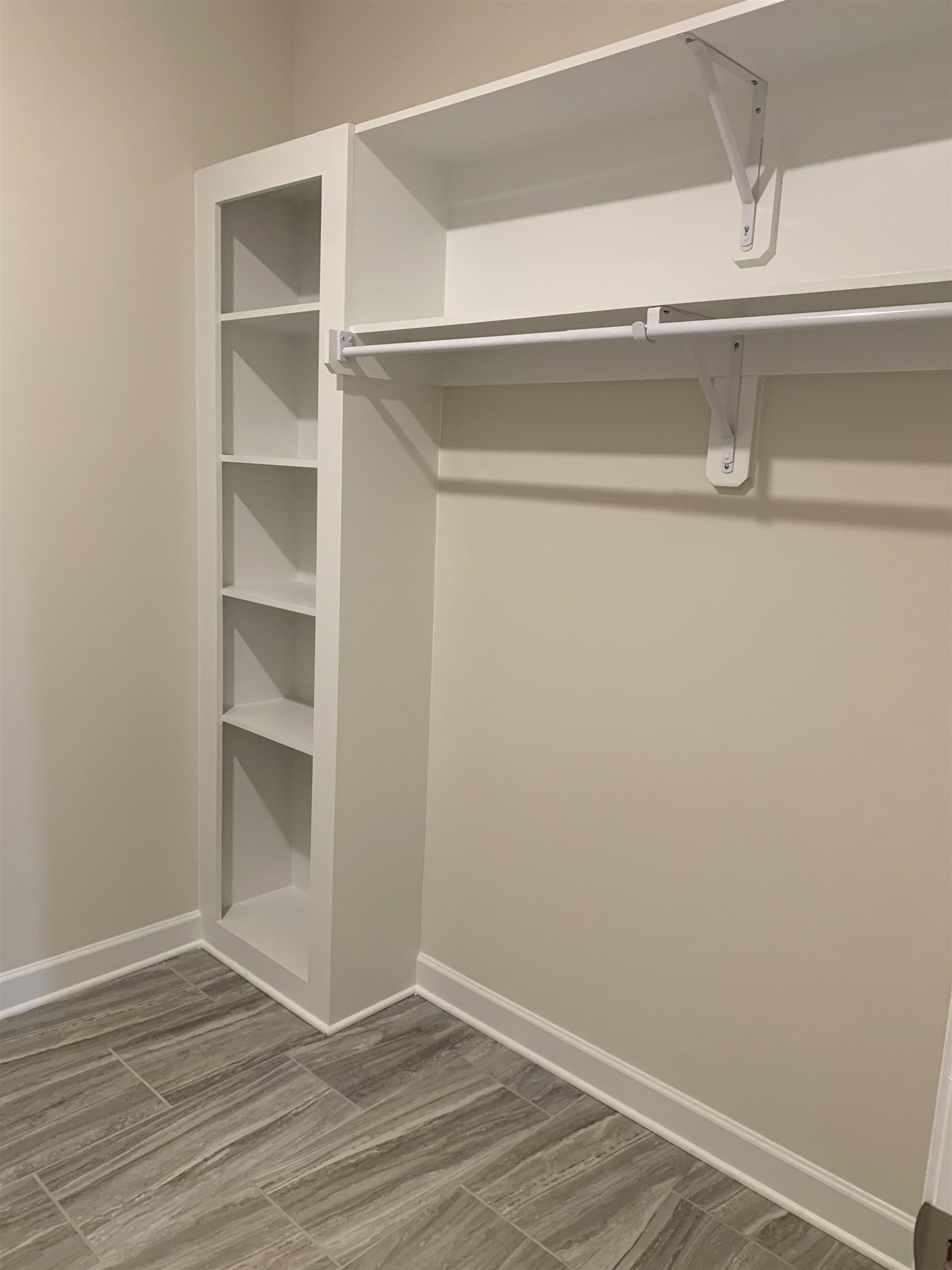 35 Grassy Hill Road Collierville, TN 38017 - Photo 21 of 33 a view of an empty walk in closet