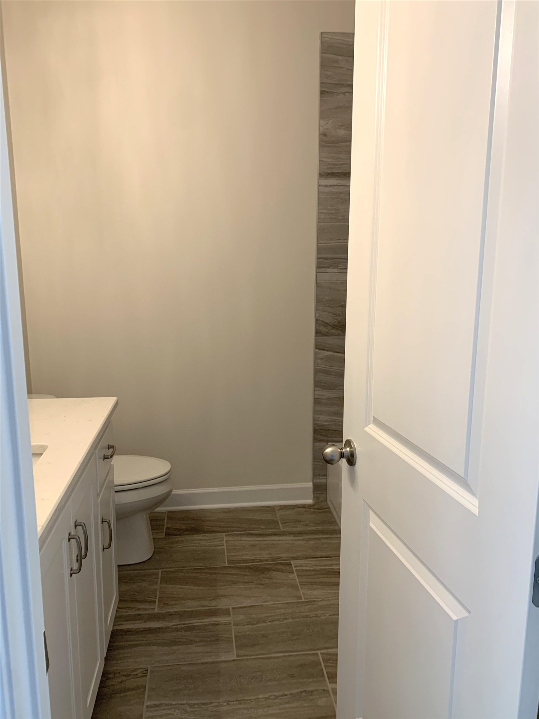 35 Grassy Hill Road Collierville, TN 38017 - Photo 27 of 33 a bathroom with a toilet and a shower