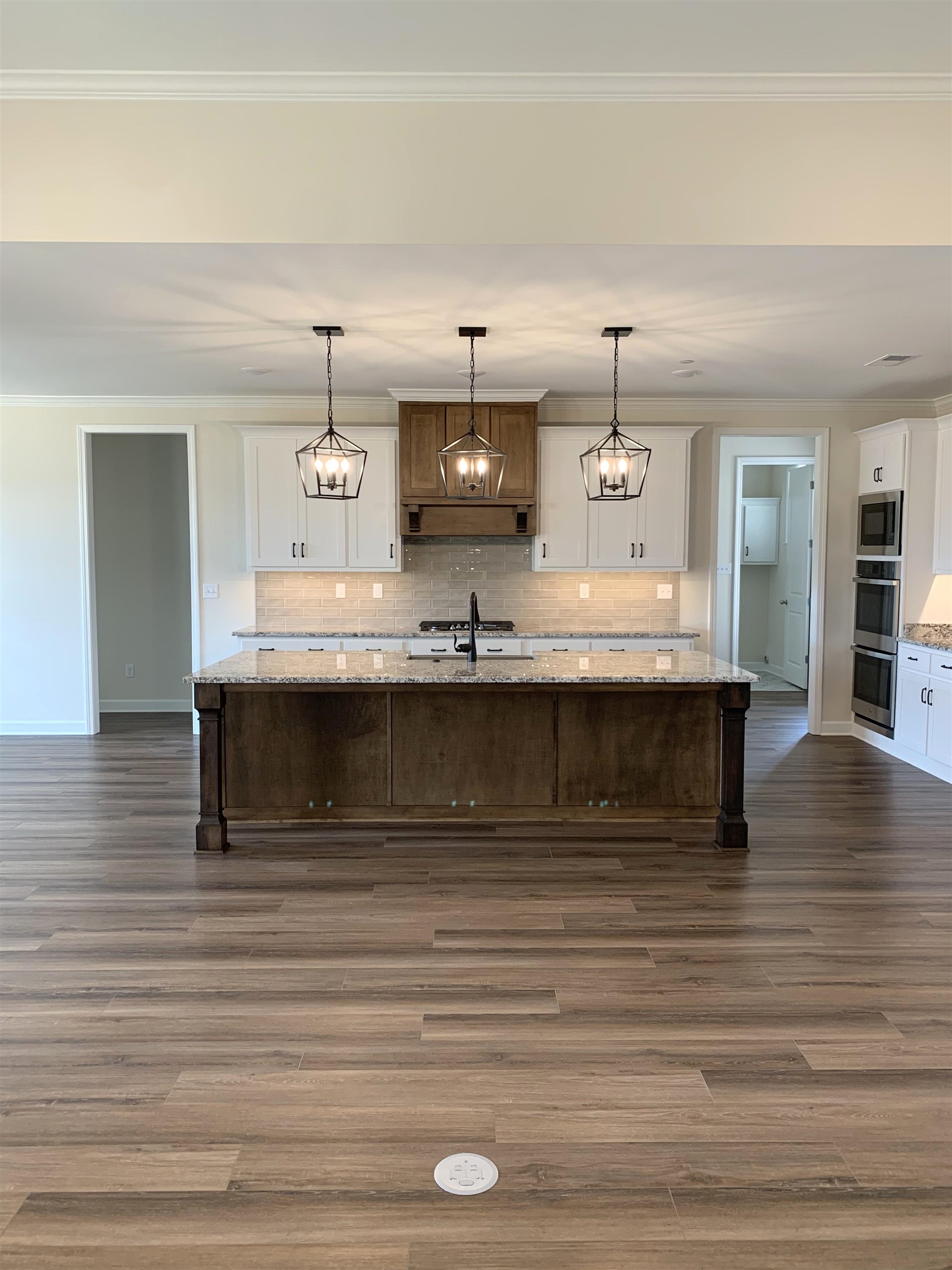 35 Grassy Hill Road Collierville, TN 38017 - Photo 4 of 33 a view of a kitchen counter top and microwave