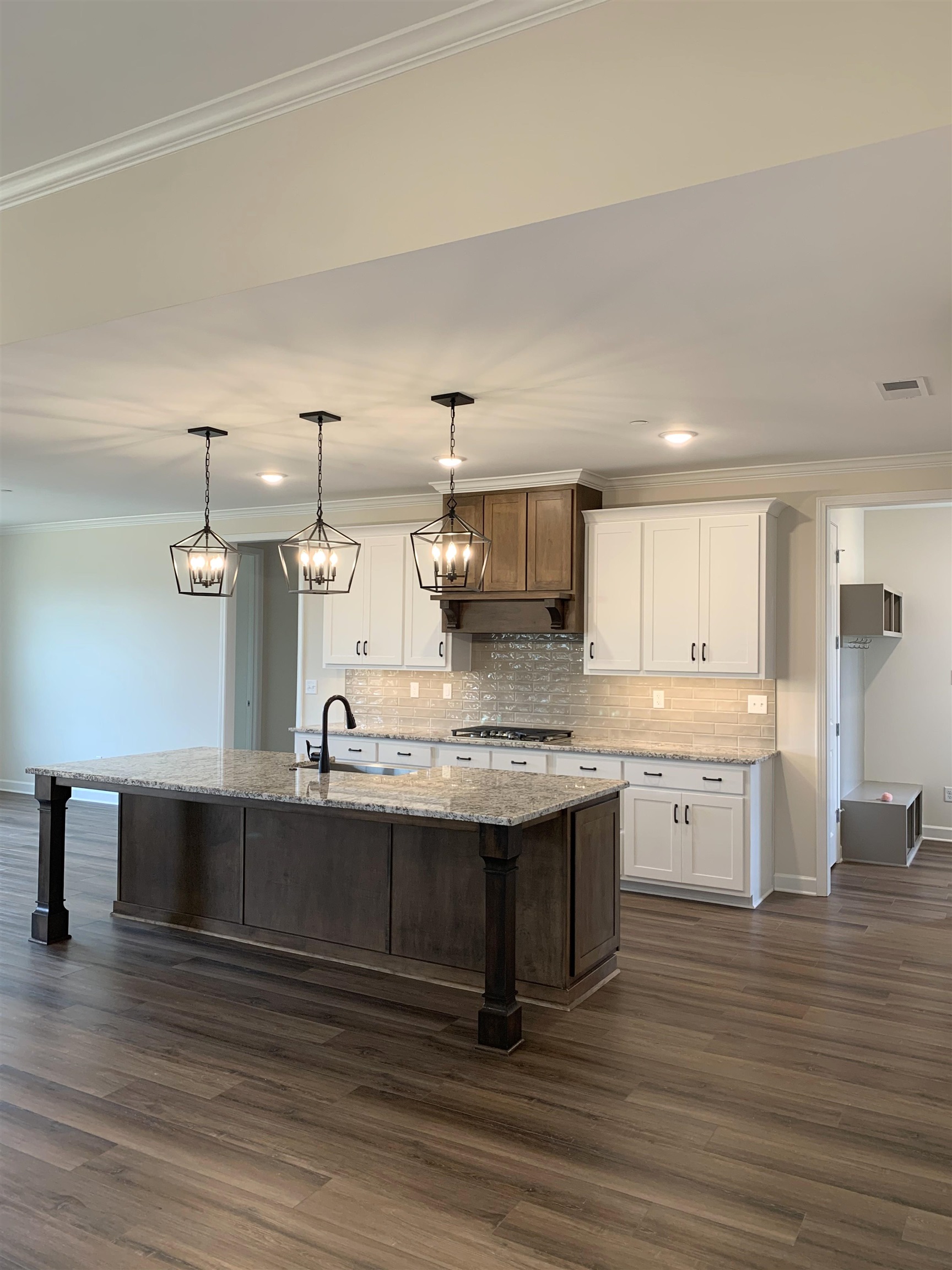 35 Grassy Hill Road Collierville, TN 38017 - Photo 5 of 33 a kitchen with granite countertop a sink stainless steel appliances and cabinets