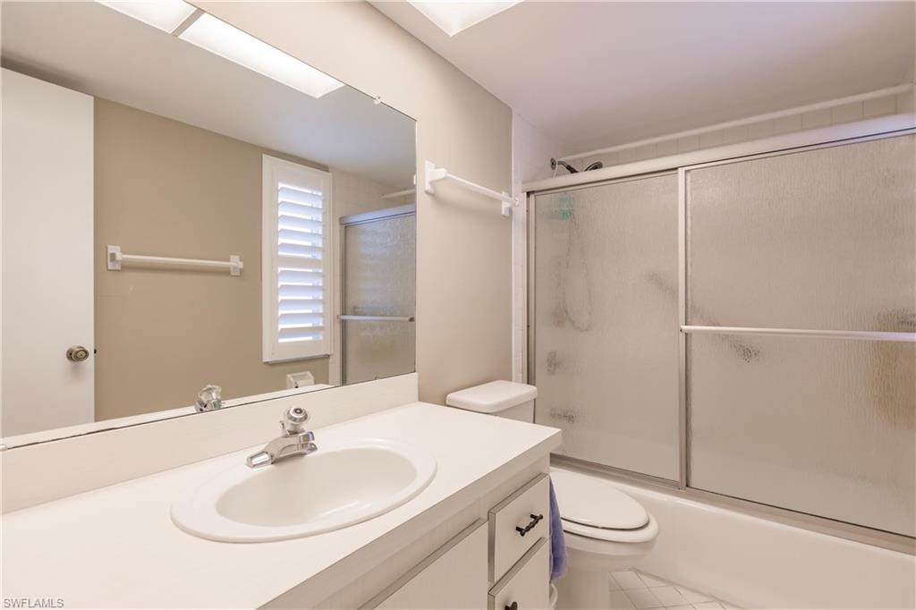 550 Teryl Road, Unit 2301 Naples, FL 34112 - Photo 20 of 31 a bathroom with a sink toilet and shower