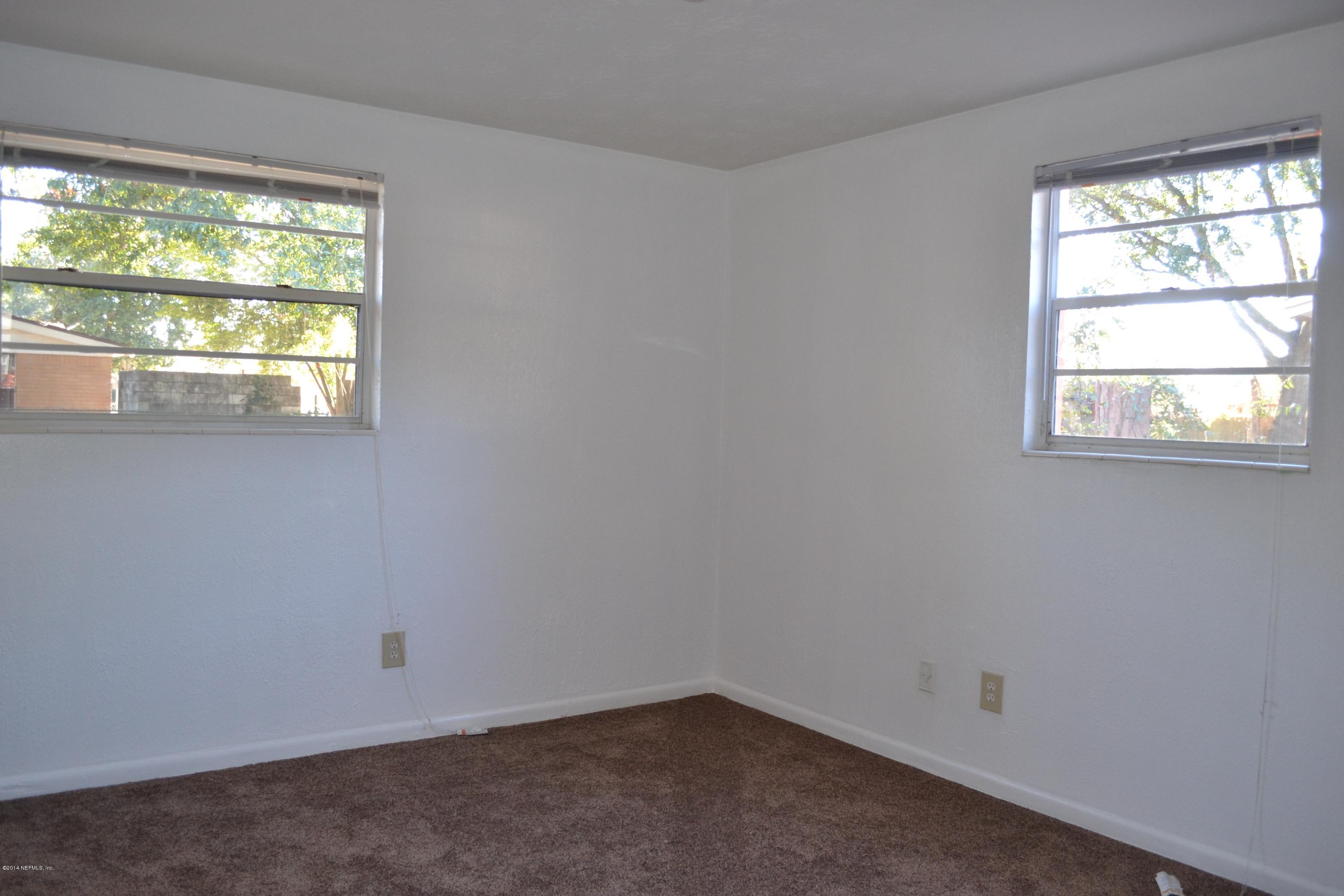 5040 Arrowsmith Road Jacksonville, FL 32208 - Photo 5 of 13 New Carpet in all 4 Bedrooms