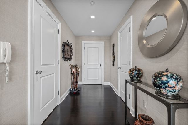 a kitchen with stainless steel appliances granite countertop a stove and a refrigerator