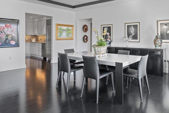 a table and chairs sitting in front of a building