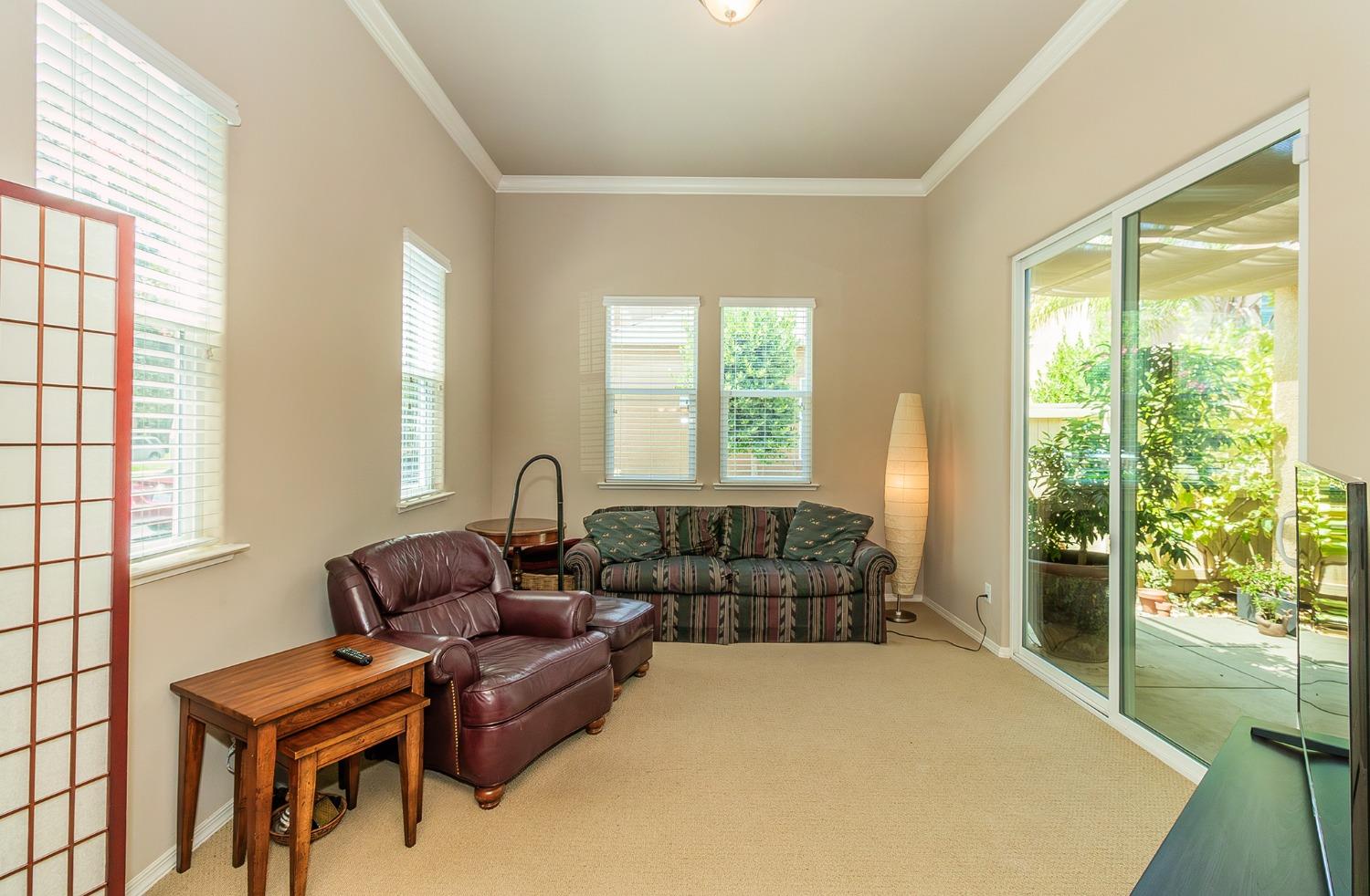 4179 Harlan Ranch Boulevard Clovis, CA 93619 - Photo 11 of 47 a bedroom with furniture and a large window