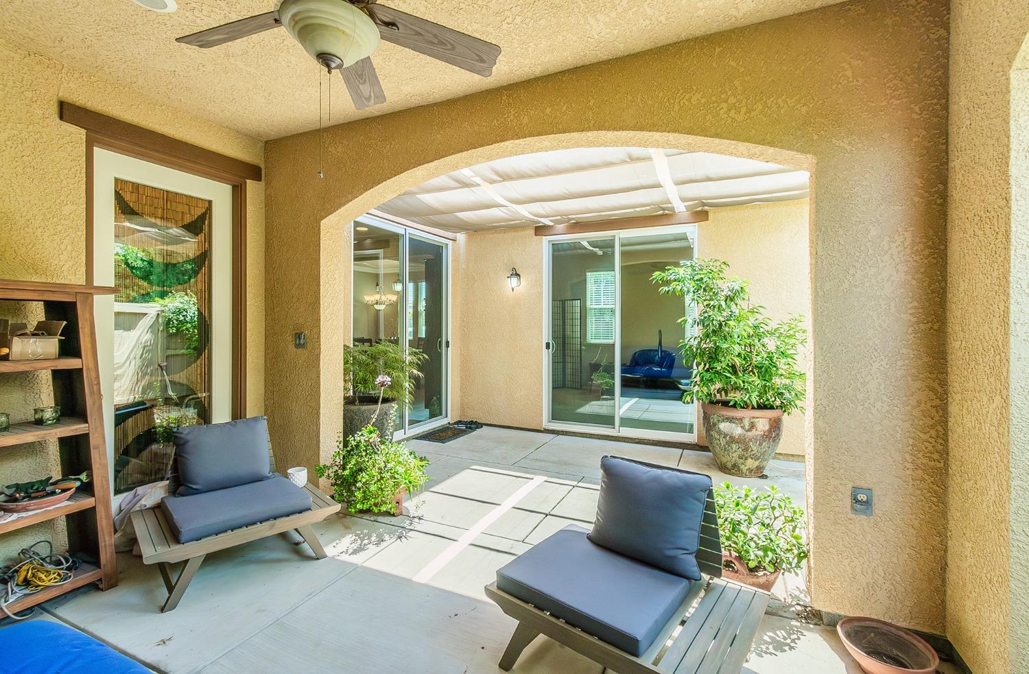 4179 Harlan Ranch Boulevard Clovis, CA 93619 - Photo 12 of 47 a living room with furniture and a large window