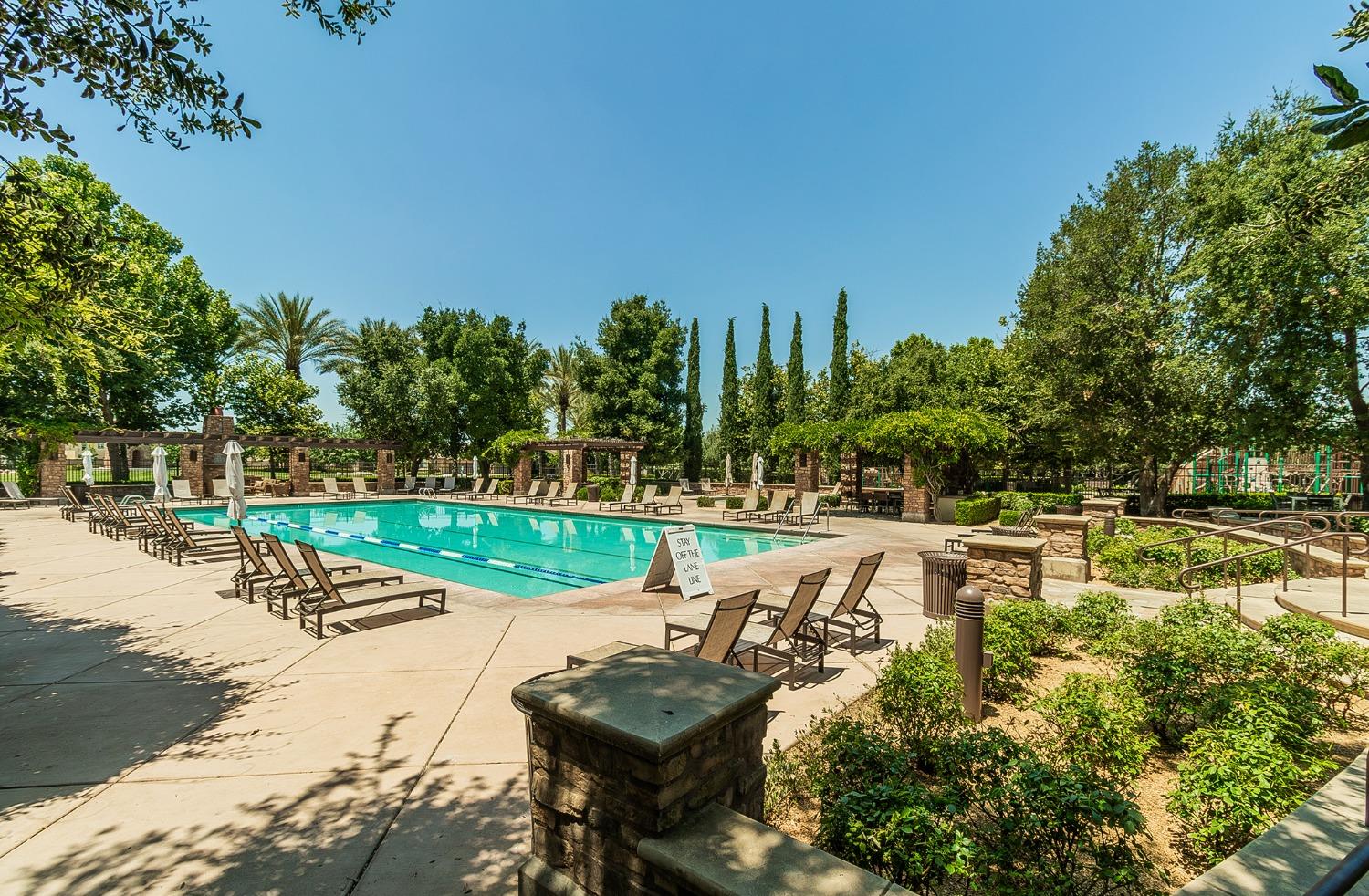 4179 Harlan Ranch Boulevard Clovis, CA 93619 - Photo 31 of 47 a view of a lake with a yard