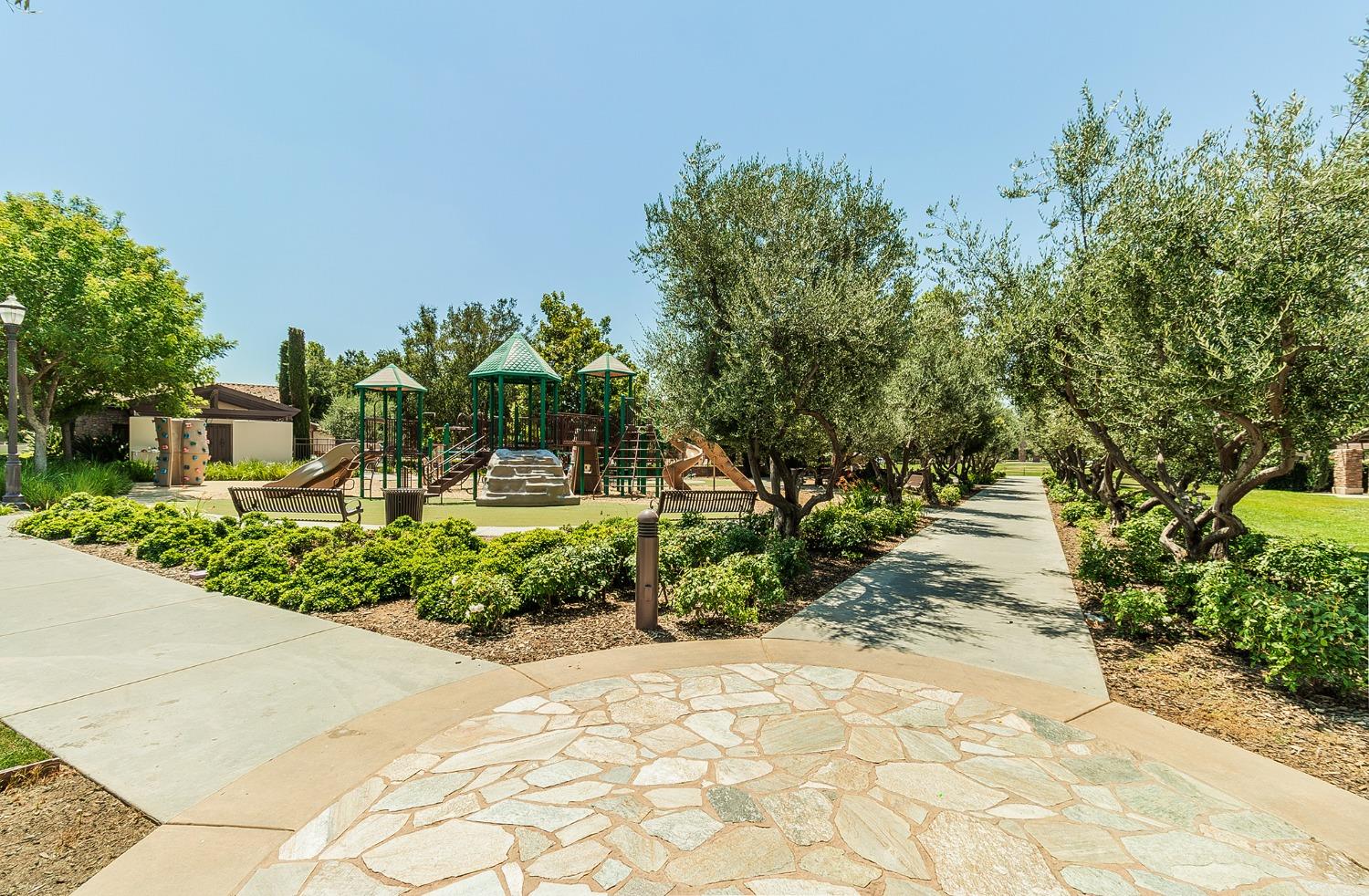 4179 Harlan Ranch Boulevard Clovis, CA 93619 - Photo 34 of 47 a view of a pathway with a yard