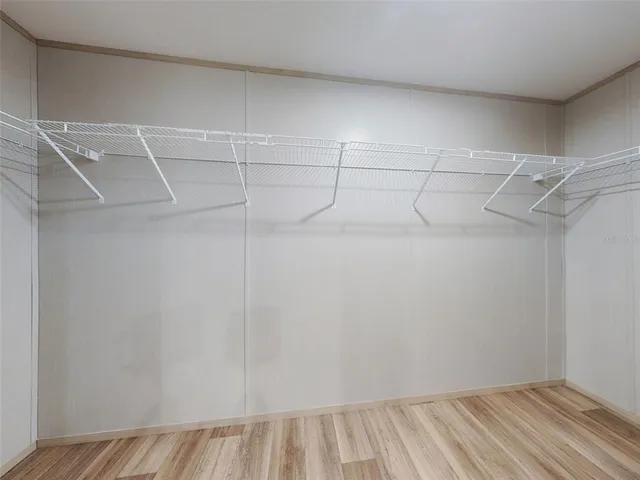 a view of a room with racks on the wall