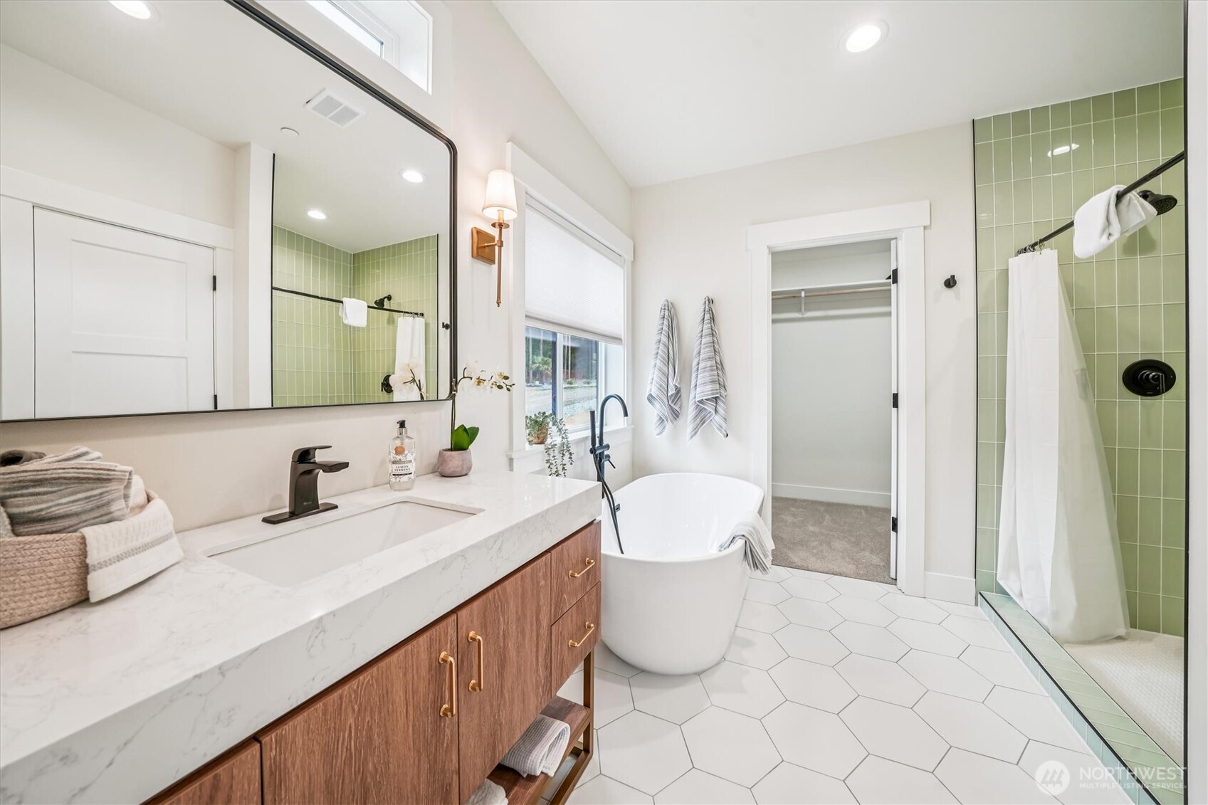 9705 117th Avenue Anderson Island, WA 98303 - Photo 22 of 40 a bathroom with a double vanity sink mirror and toilet