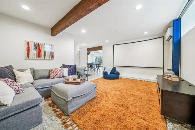 a living room with furniture and a table