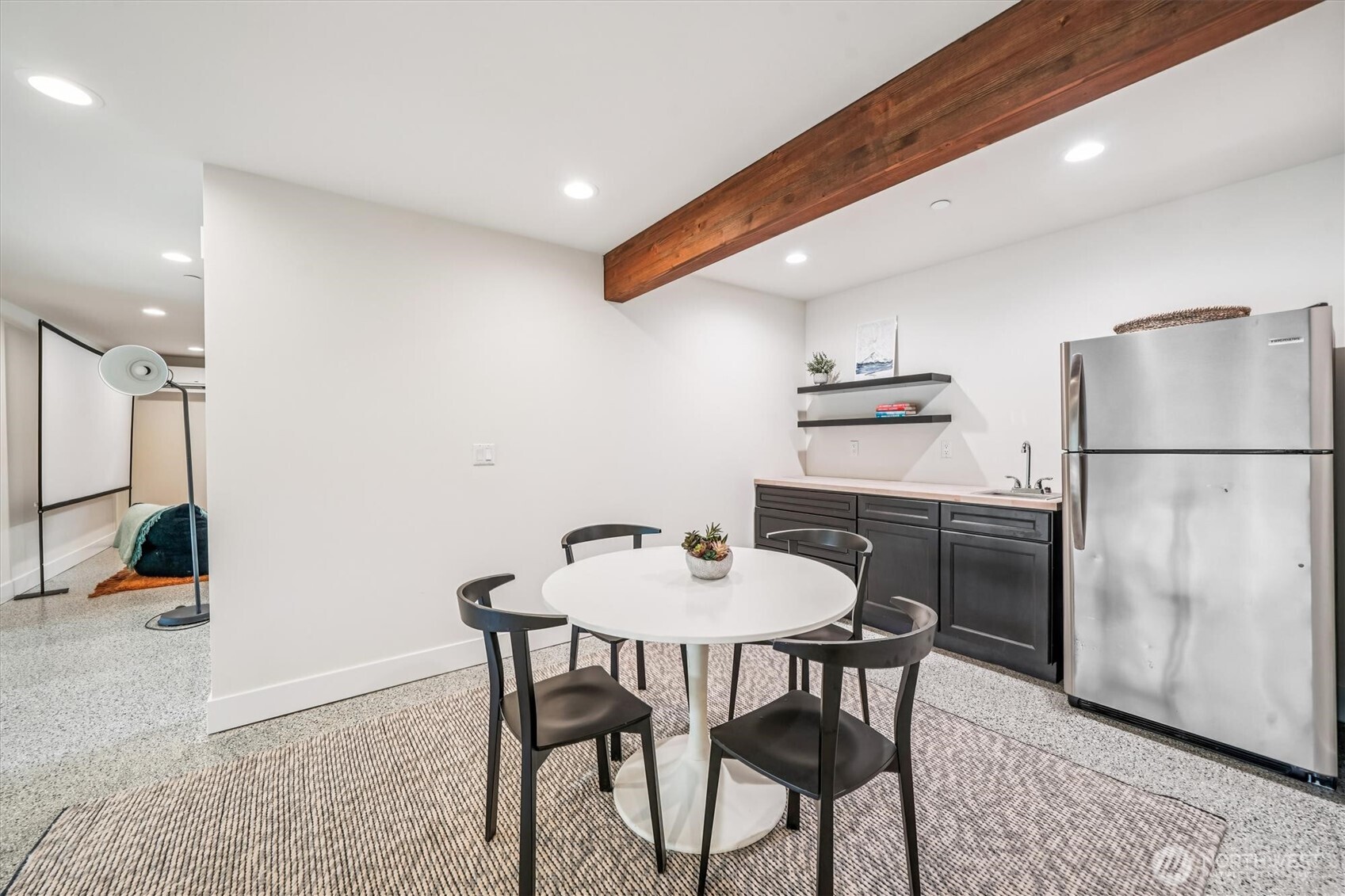 9705 117th Avenue Anderson Island, WA 98303 - Photo 31 of 40 a kitchen with a table and chairs
