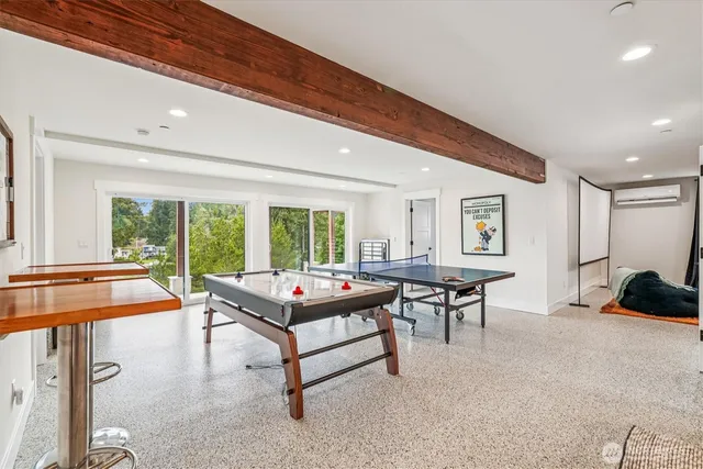 a white toilet sitting next to a bathroom sink