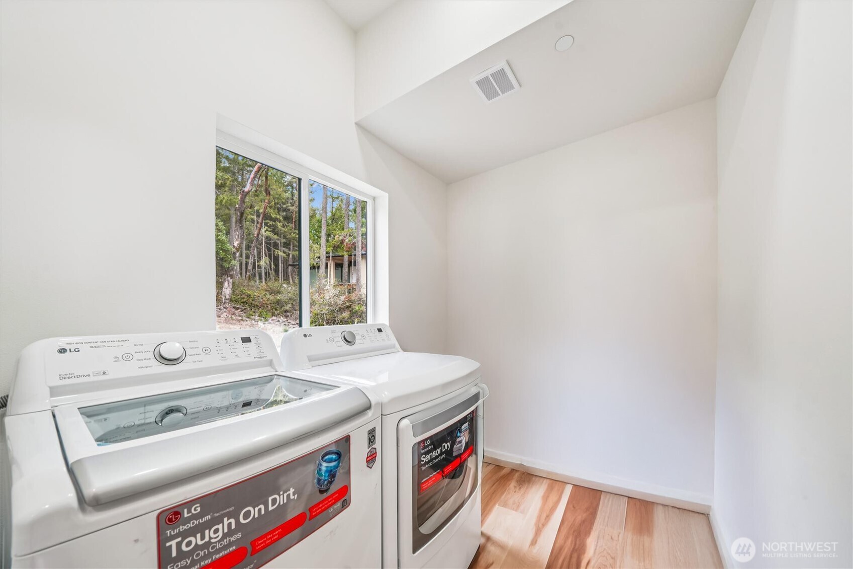 9705 117th Avenue Anderson Island, WA 98303 - Photo 39 of 40 a utility room with dryer and washer