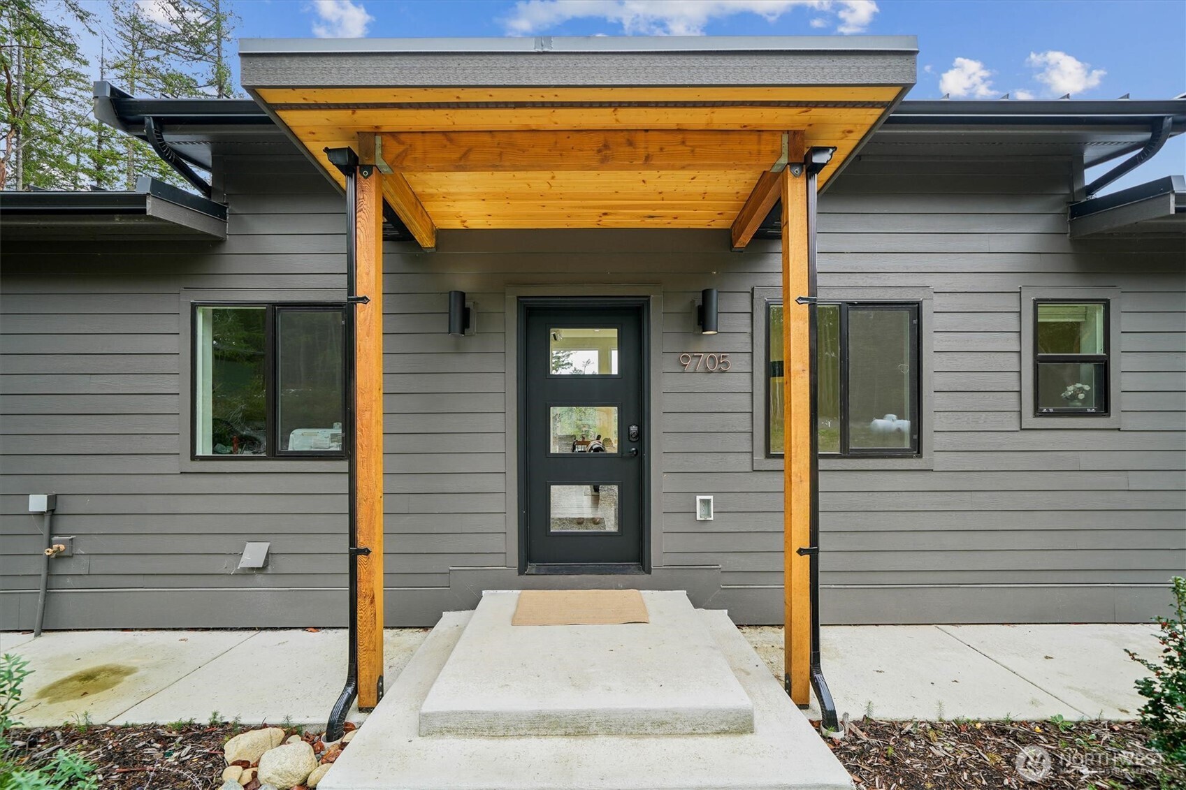 9705 117th Avenue Anderson Island, WA 98303 - Photo 9 of 40 a view of a door of the house