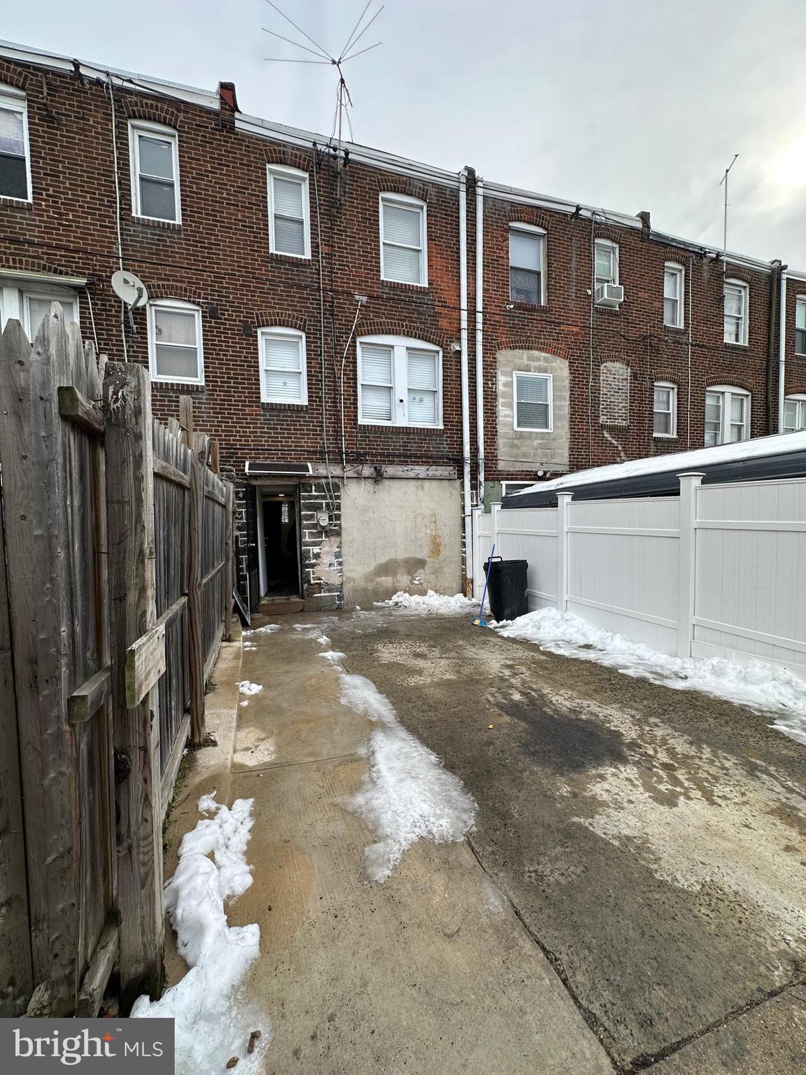 2114 Simon Street Philadelphia, PA 19124 - Photo 19 of 19 a front view of a house with a yard