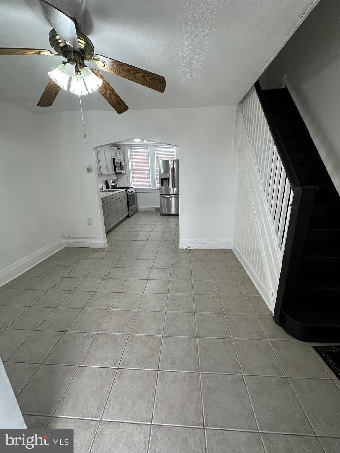 2114 Simon Street Philadelphia, PA 19124 - Photo 2 of 19 a view of a livingroom with a ceiling fan and window