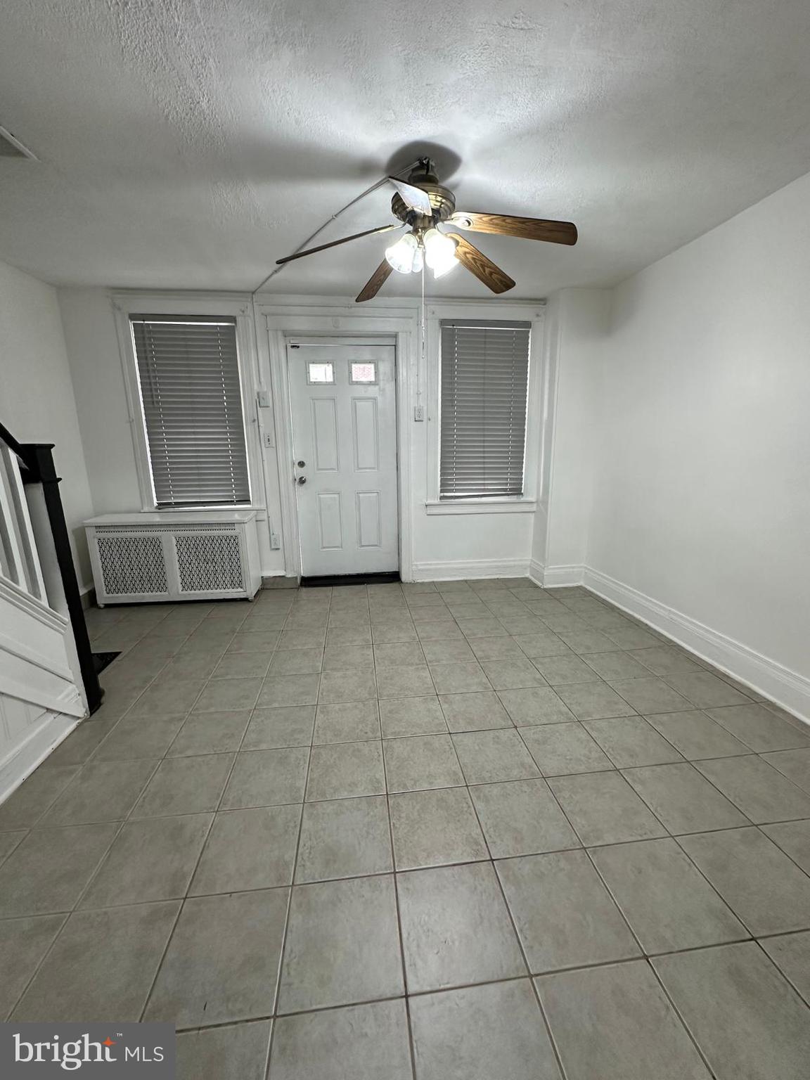 2114 Simon Street Philadelphia, PA 19124 - Photo 3 of 19 a view of a livingroom with a ceiling fan and window