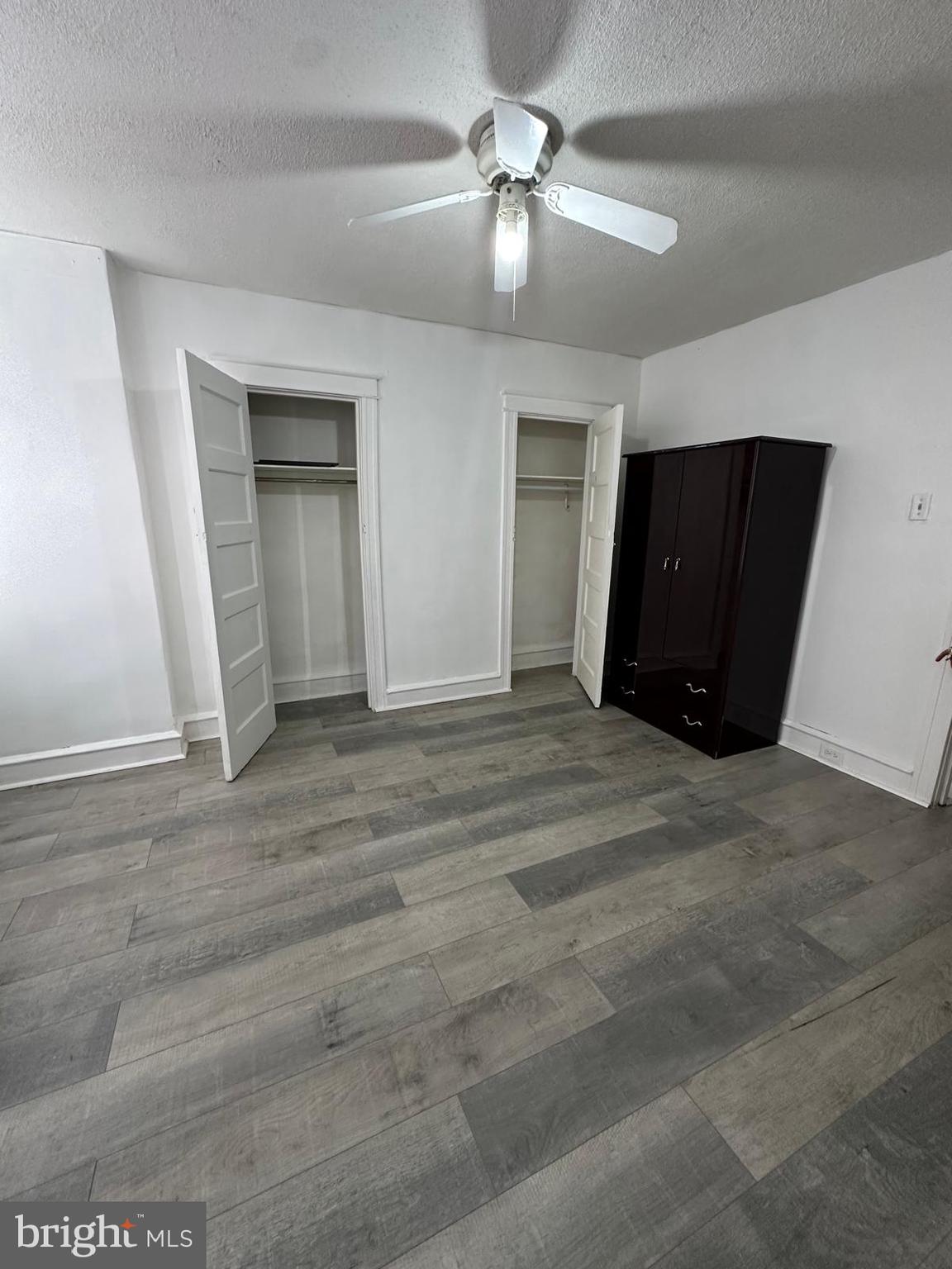 2114 Simon Street Philadelphia, PA 19124 - Photo 8 of 19 a view of an empty room with closet and a ceiling fan