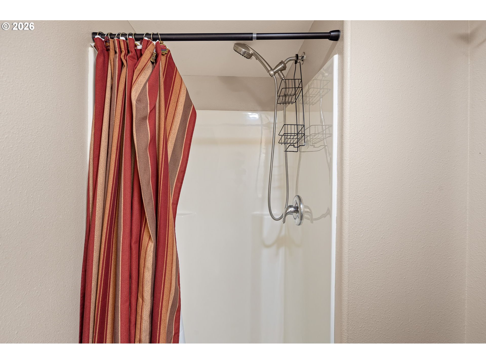 88481 1st Avenue Florence, OR 97439 - Photo 28 of 43 a bathroom with a shower and a curtain