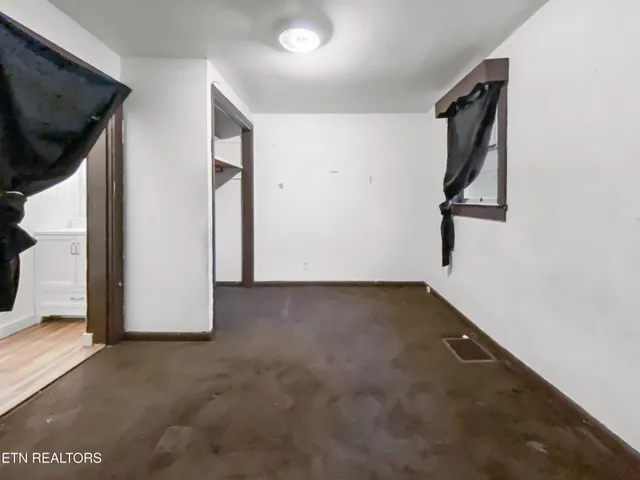 a view of a hallway with staircase