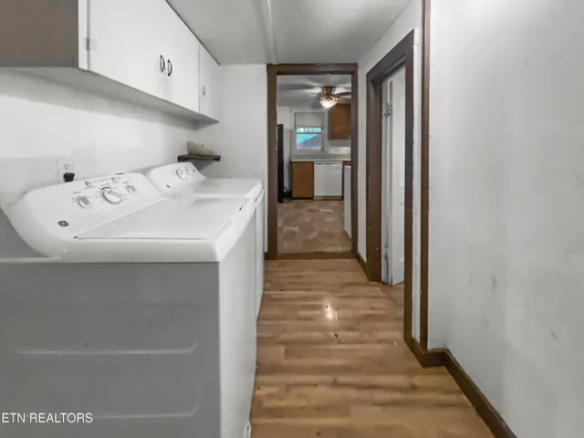 a en suite bathroom with a sink and mirror