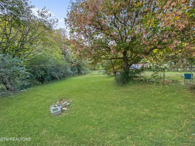 a view of a golf course with a lake