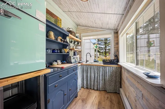 a view of a chair and table in a balcony
