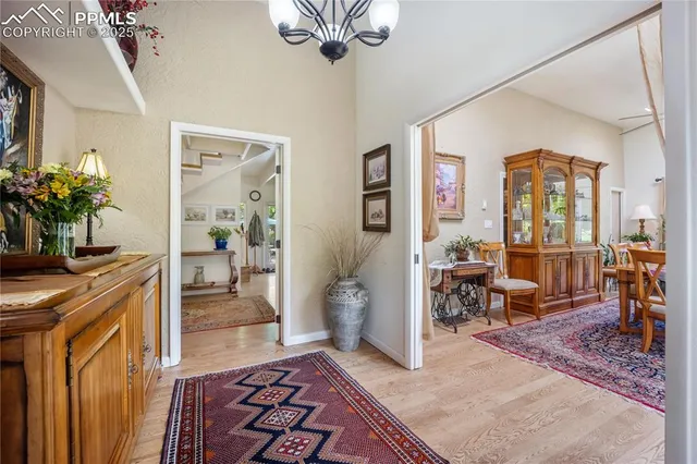 a living room with furniture and a table