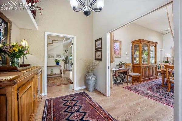 a living room with furniture and a table