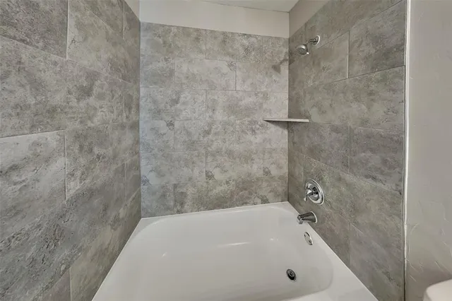 a bathroom with a bathtub