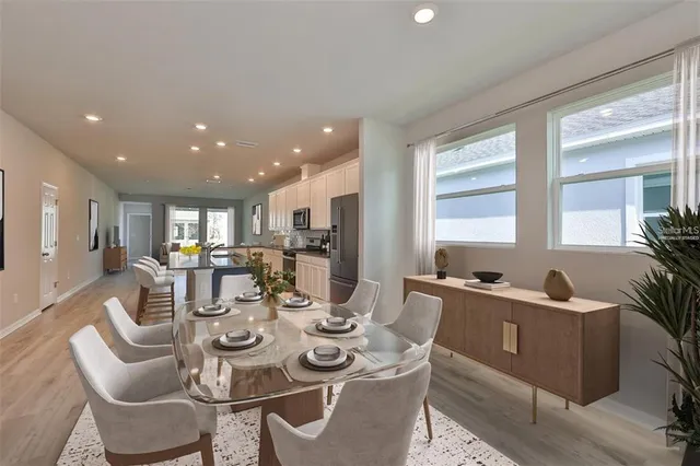 a view of a dining room with furniture