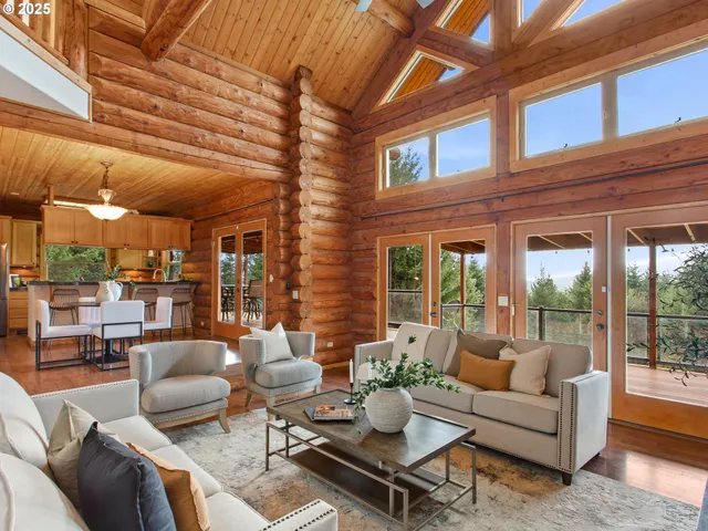 a outdoor living space with patio furniture and a ceiling fan