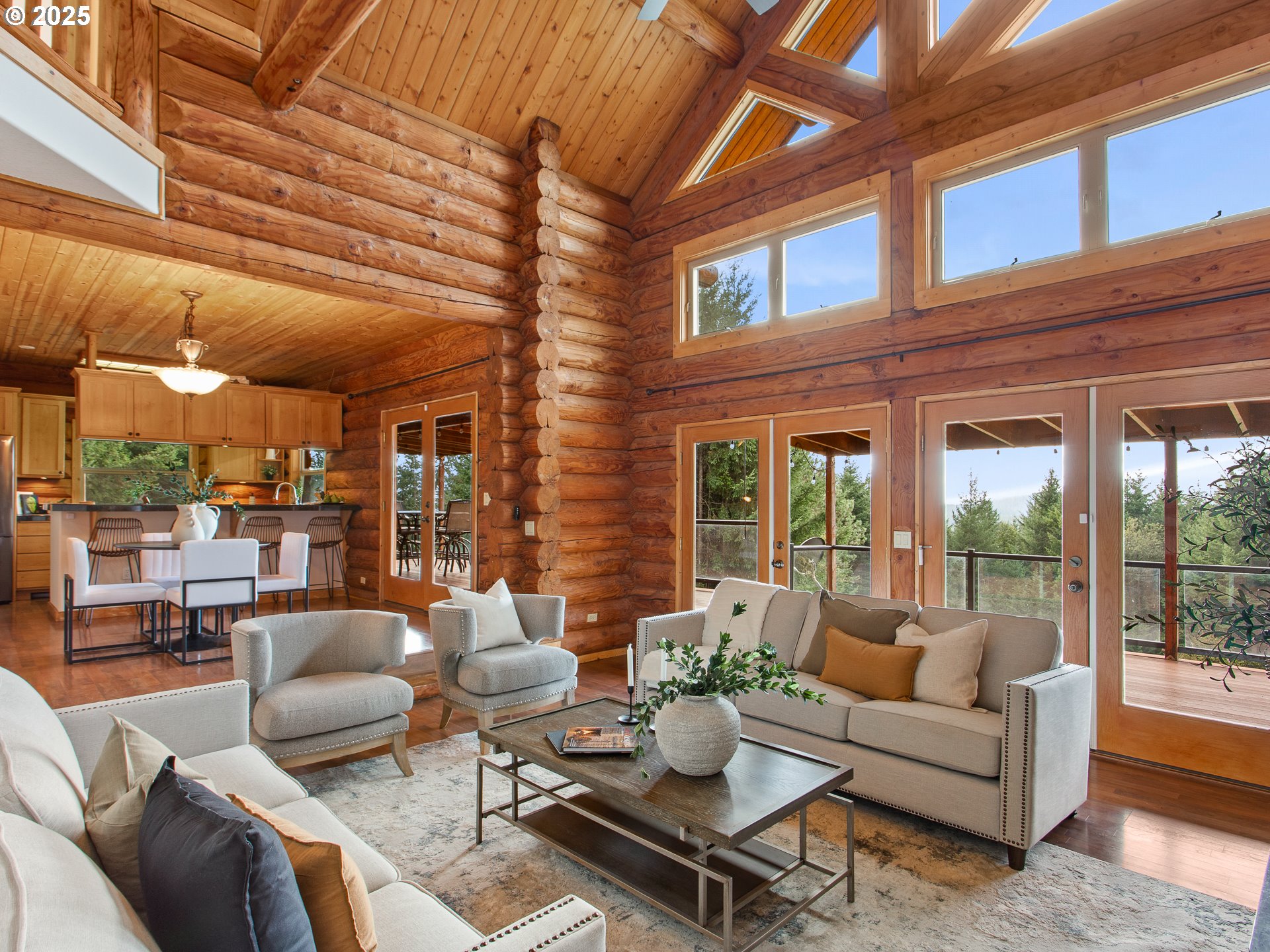 25520 Northeast 58th Street Vancouver, WA 98682 - Photo 11 of 48 a outdoor living space with patio furniture and a ceiling fan
