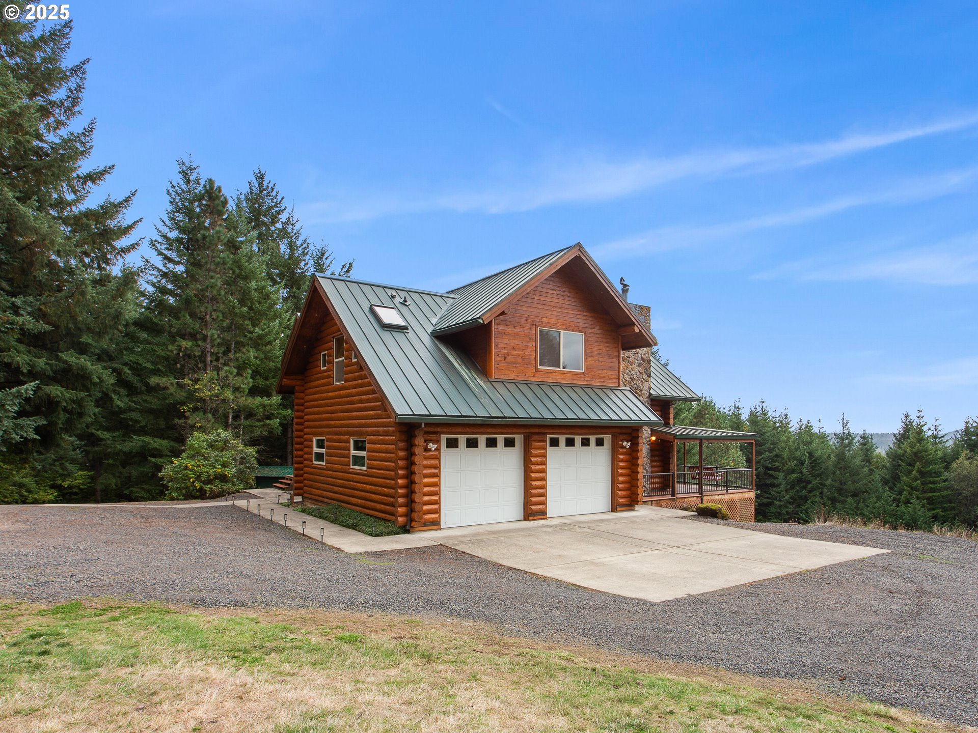 25520 Northeast 58th Street Vancouver, WA 98682 - Photo 2 of 48 a front view of a house with a yard and garage