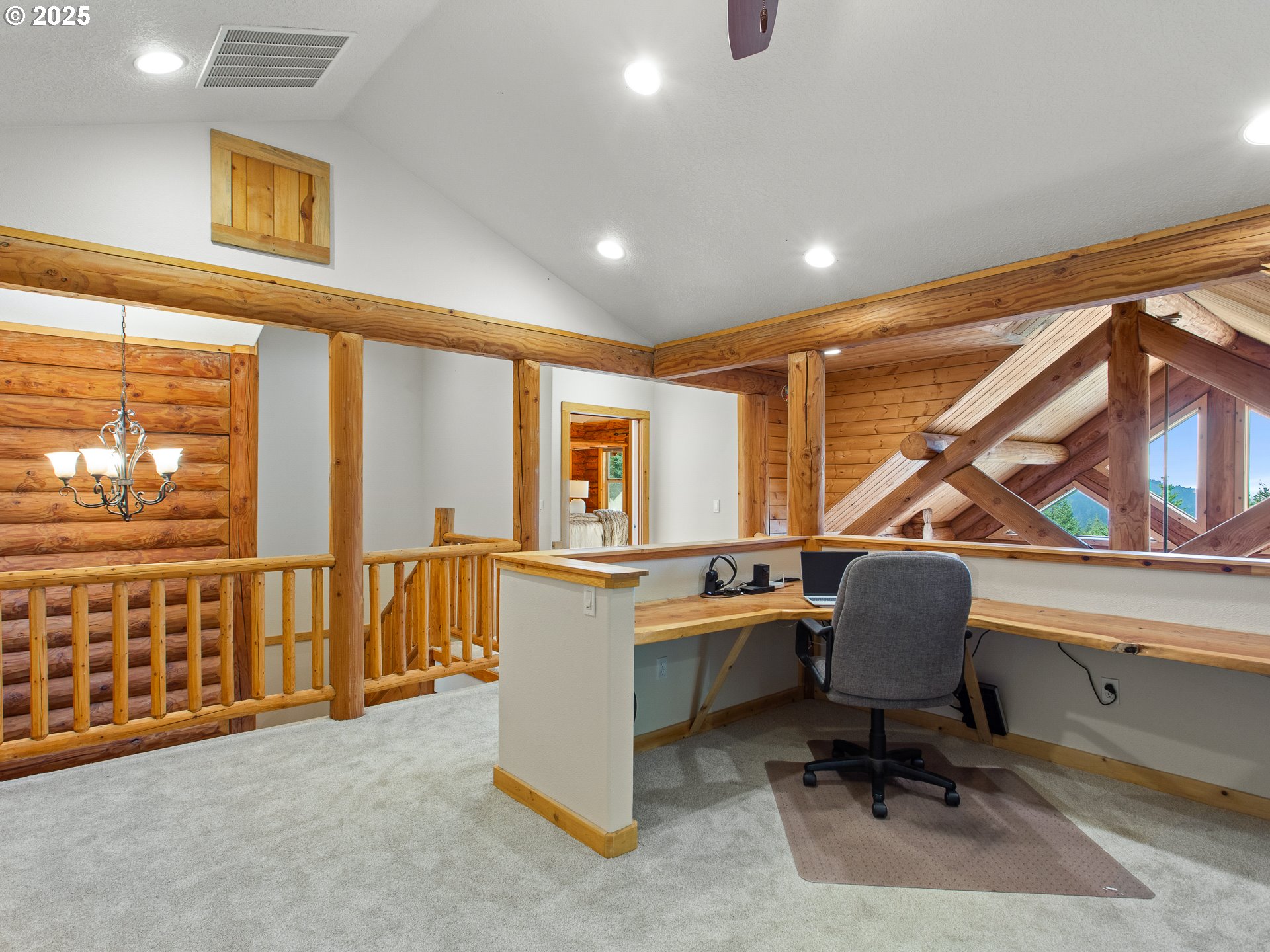 25520 Northeast 58th Street Vancouver, WA 98682 - Photo 21 of 48 a view of a workspace with furniture and a window