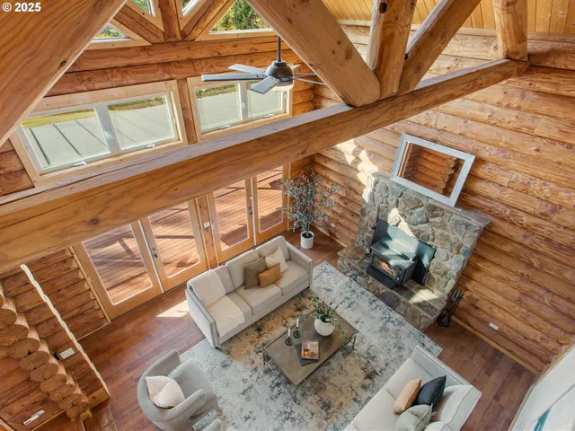 a view of a couch in wooden floor