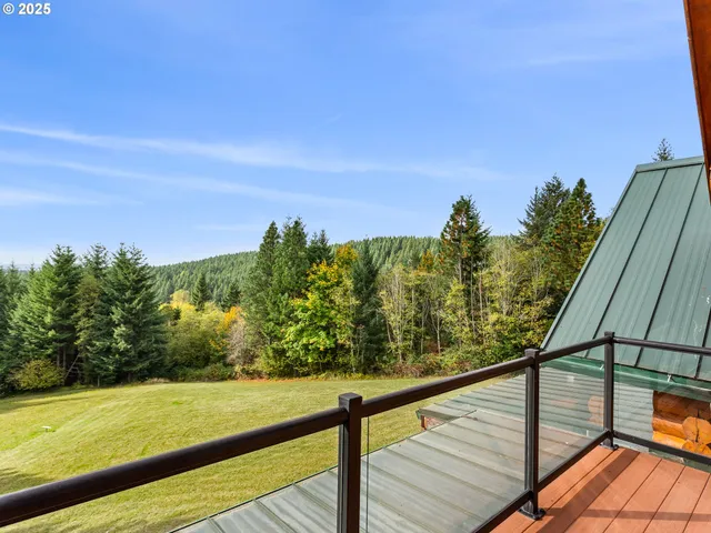 a view of a balcony with ocean view